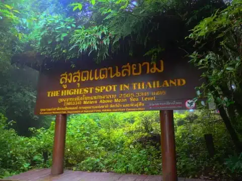 Stand on the summit of Doi Inthanon, the highest point in Thailand, and admire the panoramic views of the mountains and the clouds. Feel the cool breeze and the fresh air as you explore the nature trails and the royal pagodas.