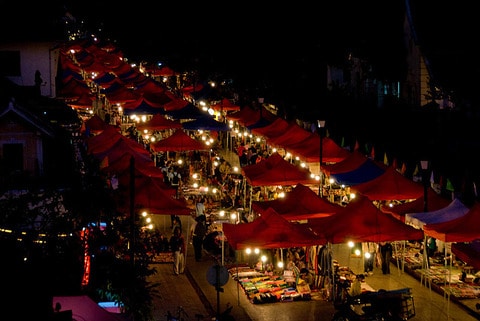 Dazzling lights, delicious smells, and friendly faces - the Luang Prabang night market is a feast for the senses!