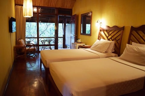 Immerse yourself in the rich culture of Luang Prabang, with the Mekong River flowing just steps away. This charming room at Sala Prabang offers a tranquil escape after a day of exploration.